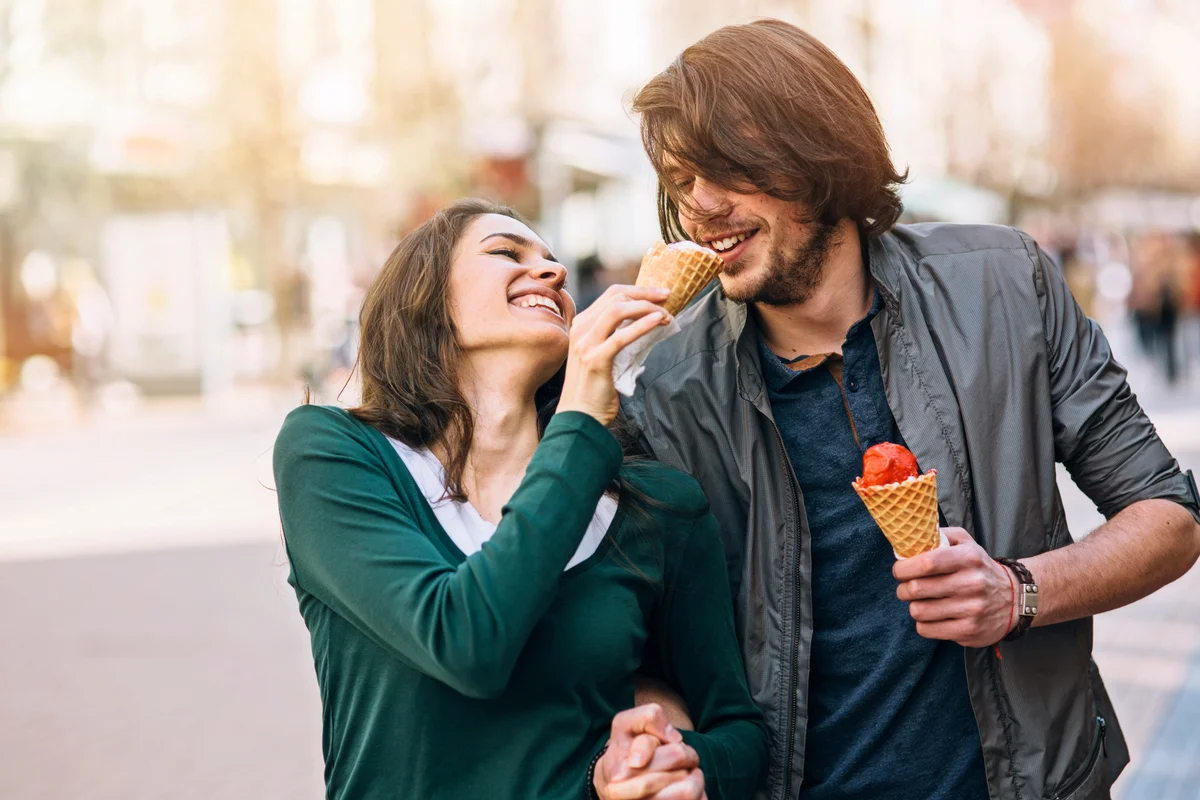 Young couple eating an ice cream