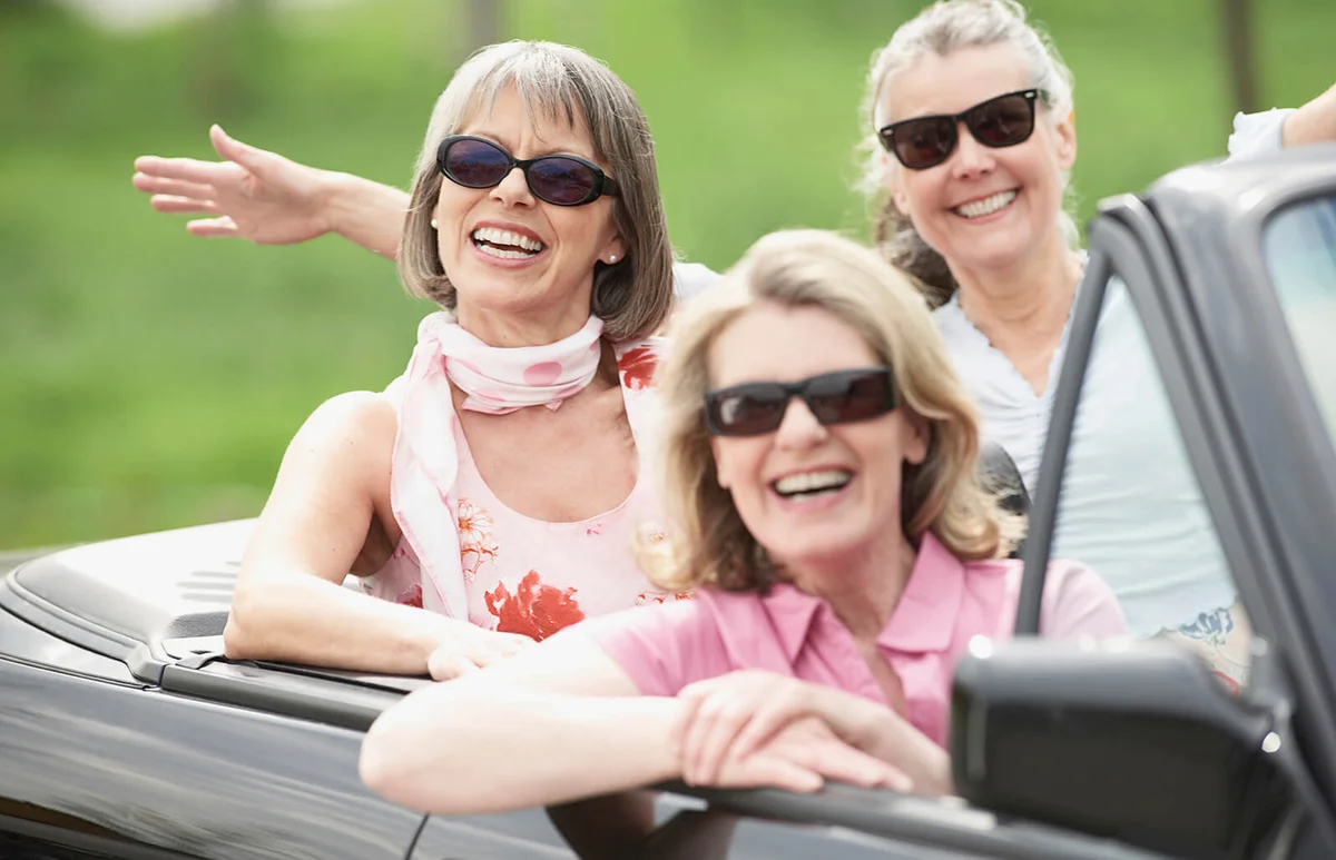 Three older women going on a road trip