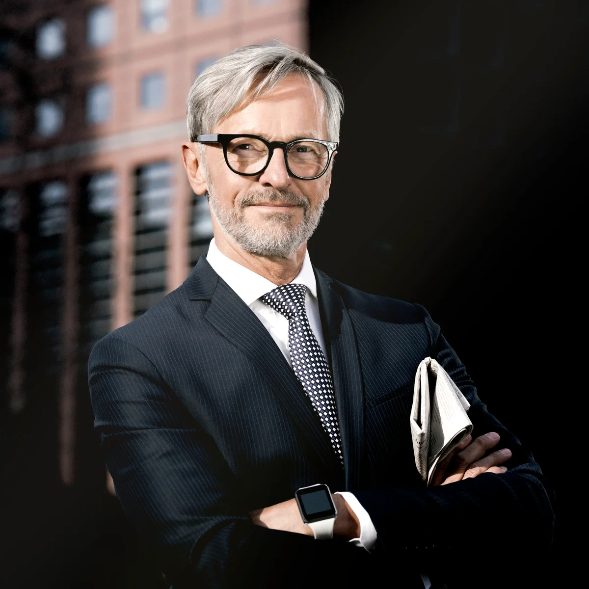 Confident grey-haired businessman