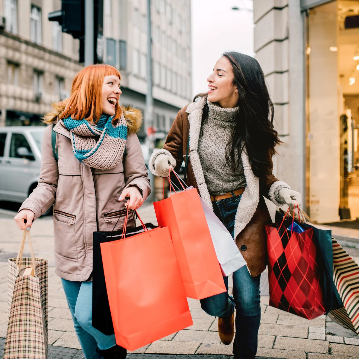 Girls carrying shopping bags
