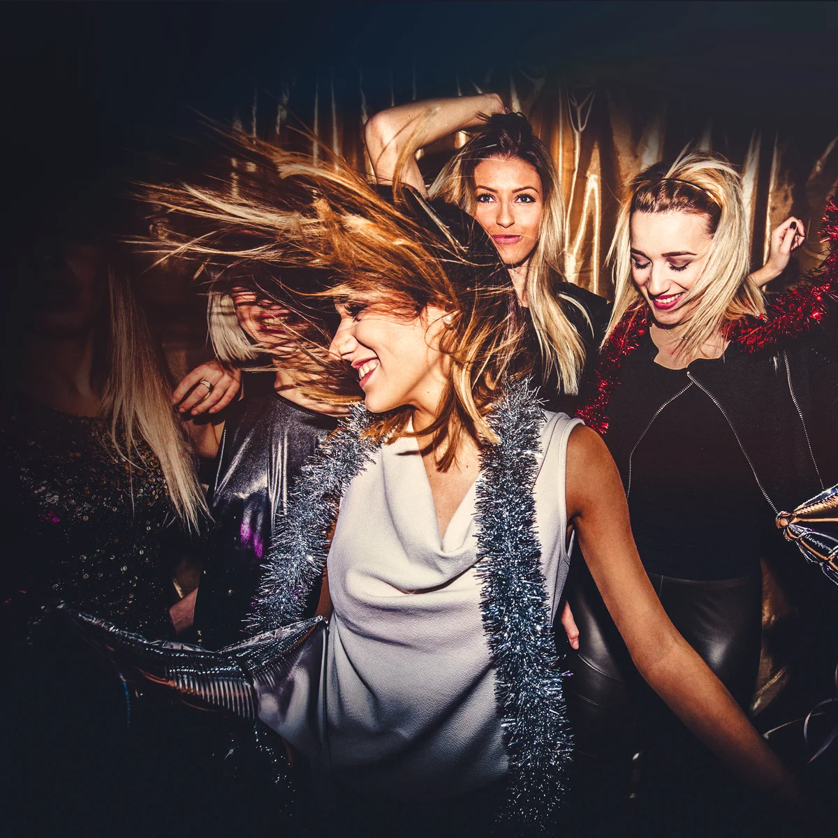 Young group of women dancing in a nightclub