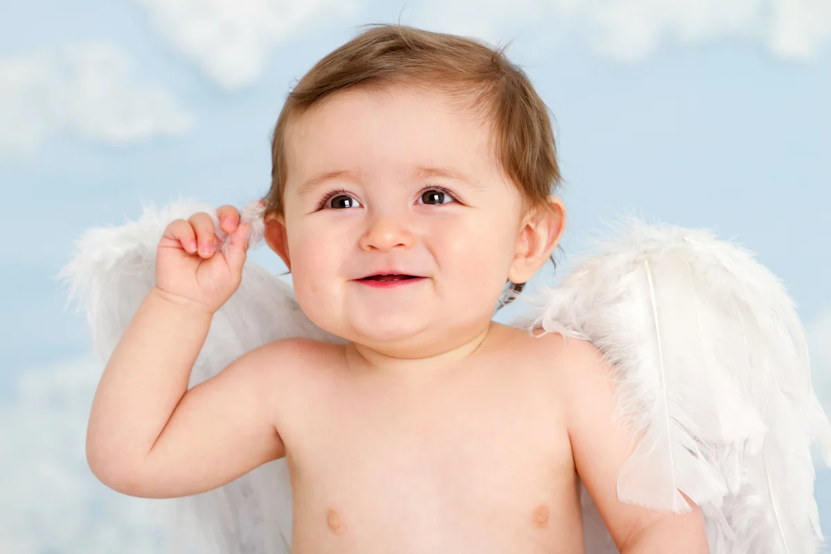 Cute baby boy as an angel