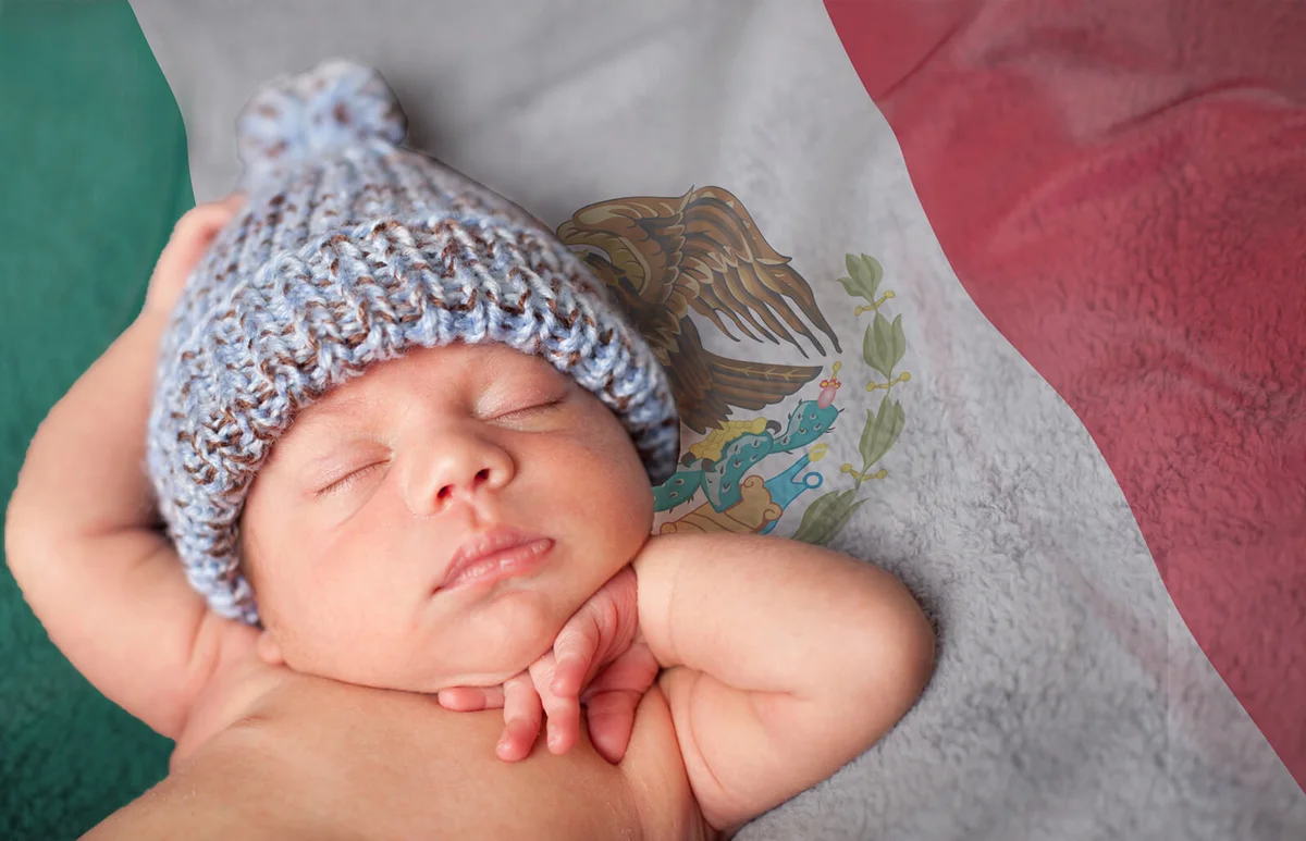 Close Up of Newborn Baby Boy Wearing Knit Hat