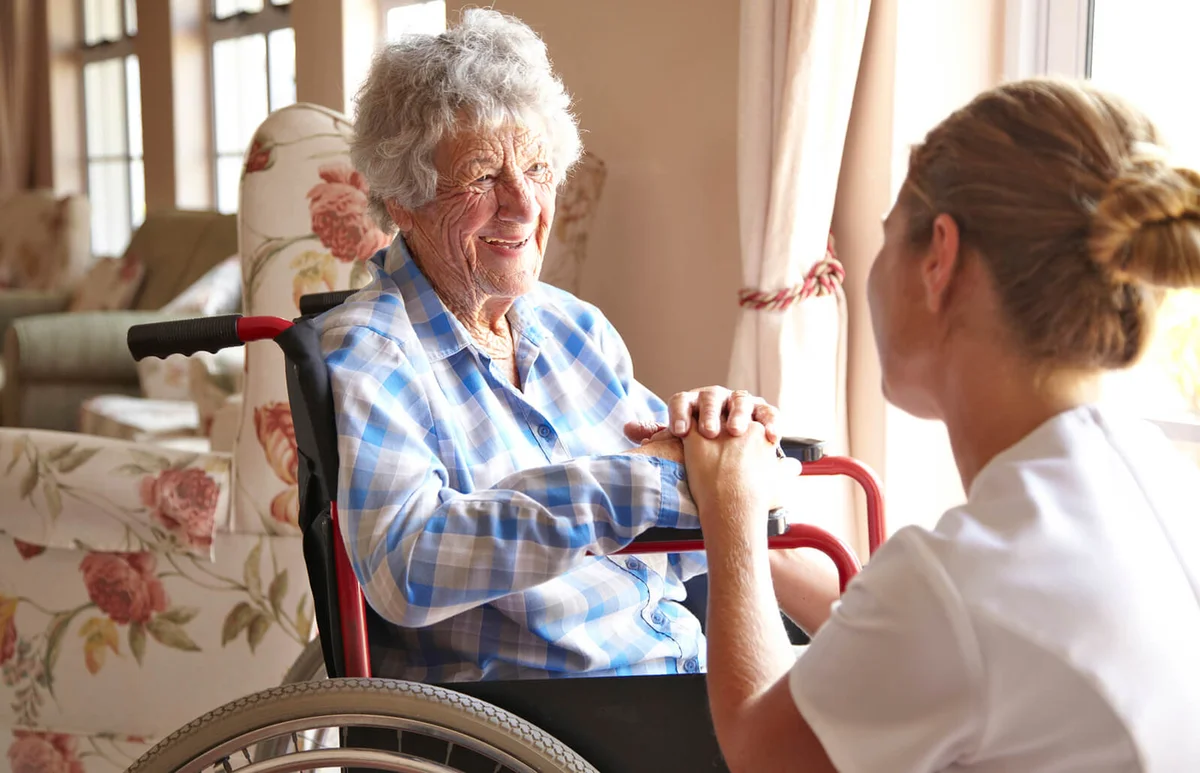 Elderly woman in a private retirement home