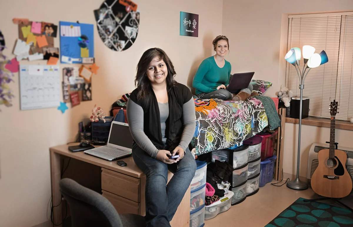 Students relaxing in dorm room