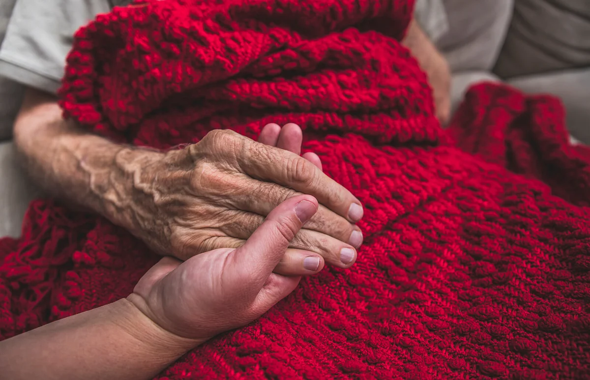 Hospice Nurse visiting an elderly male patient