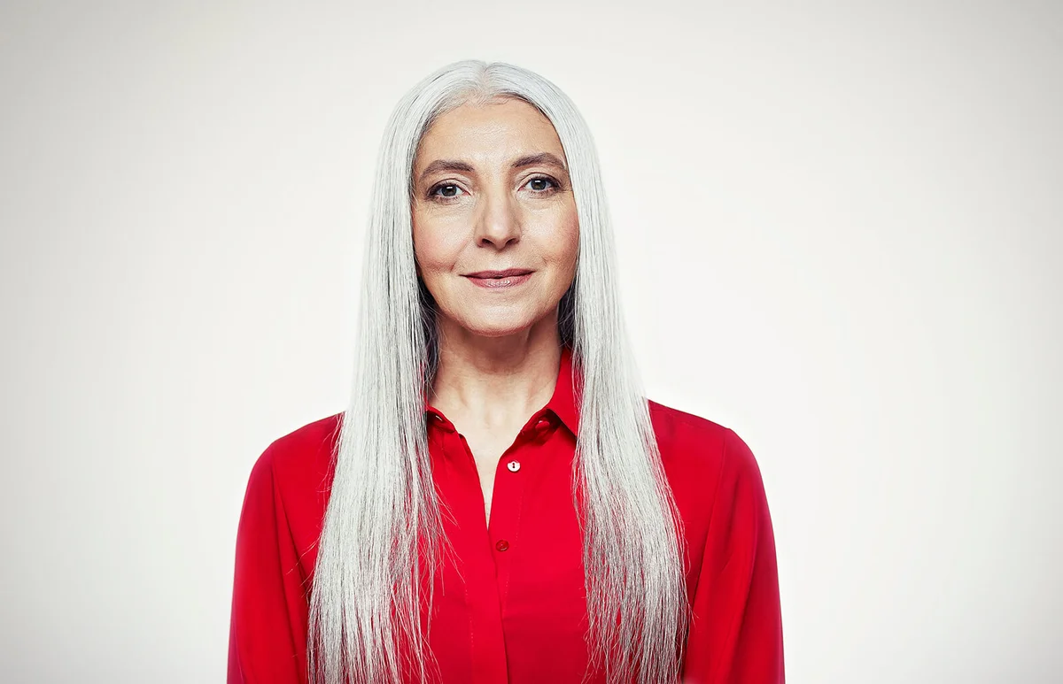 Head and shoulders portrait of mature woman