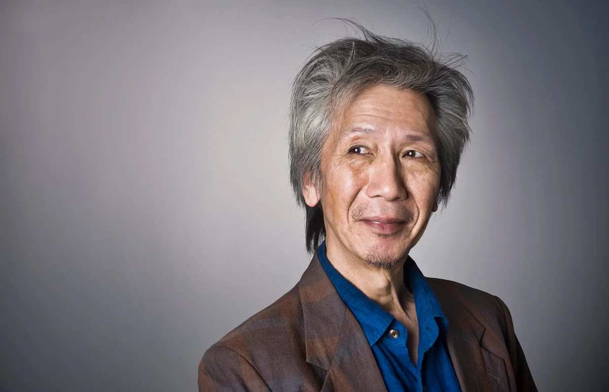 Portrait of Middle Aged Asian Male with Grey Hair