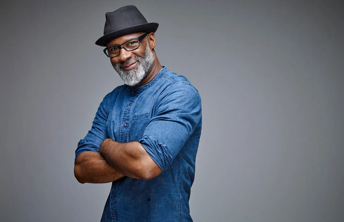 Portrait of smiling man with grey beard