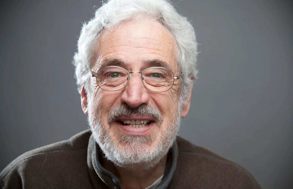 Senior man looking at camera