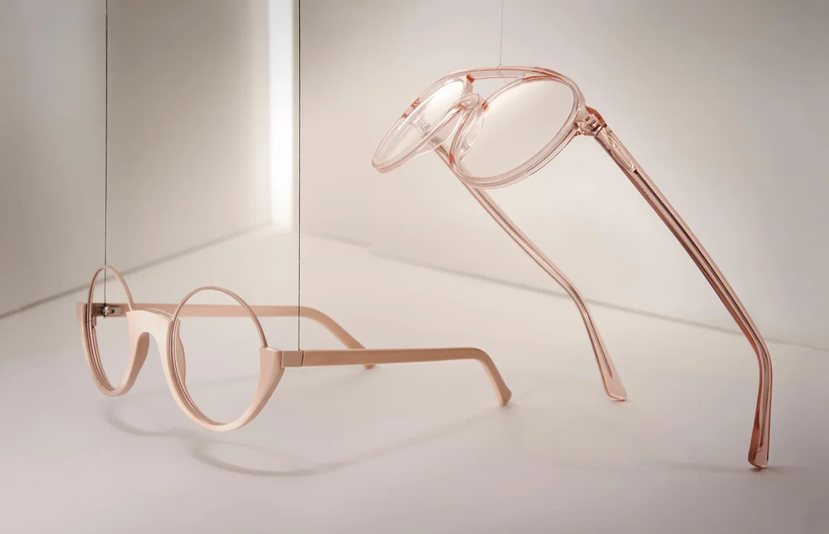 Groups of reading glasses hanging and suspended