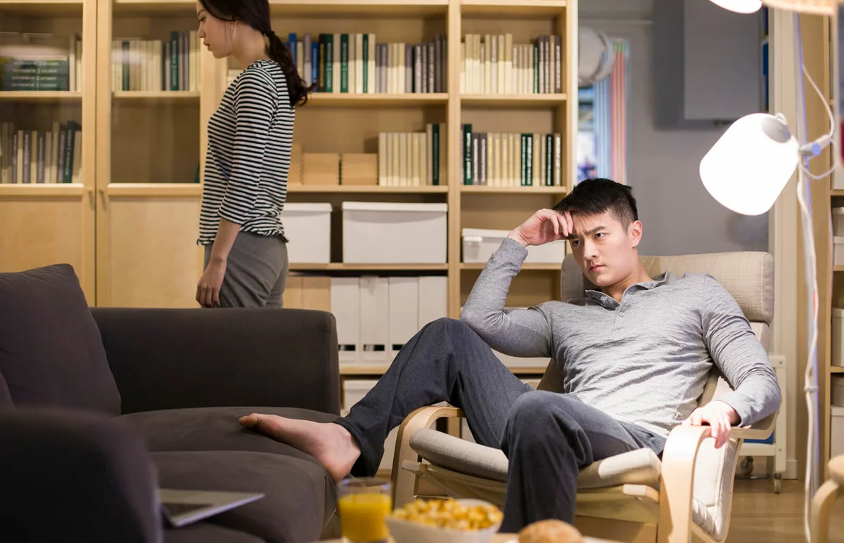 Angry couple in living room
