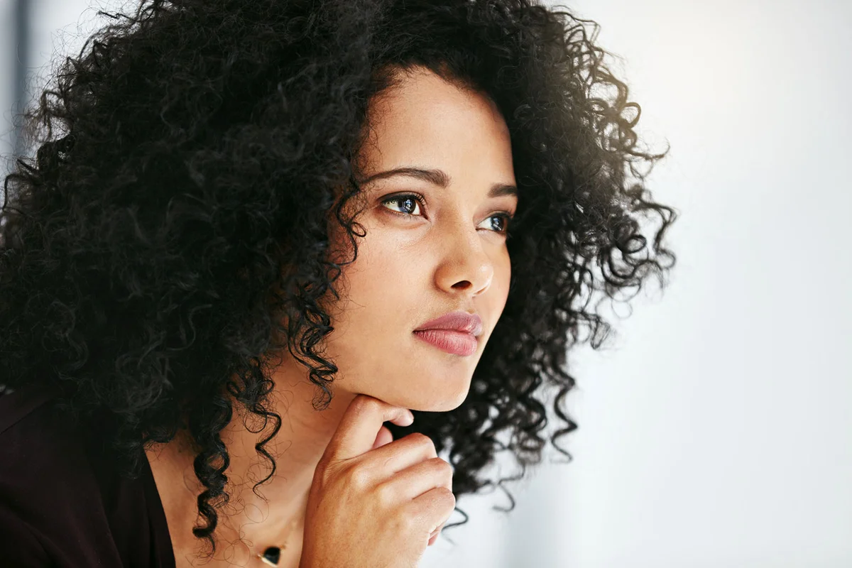 Woman thinking intently
