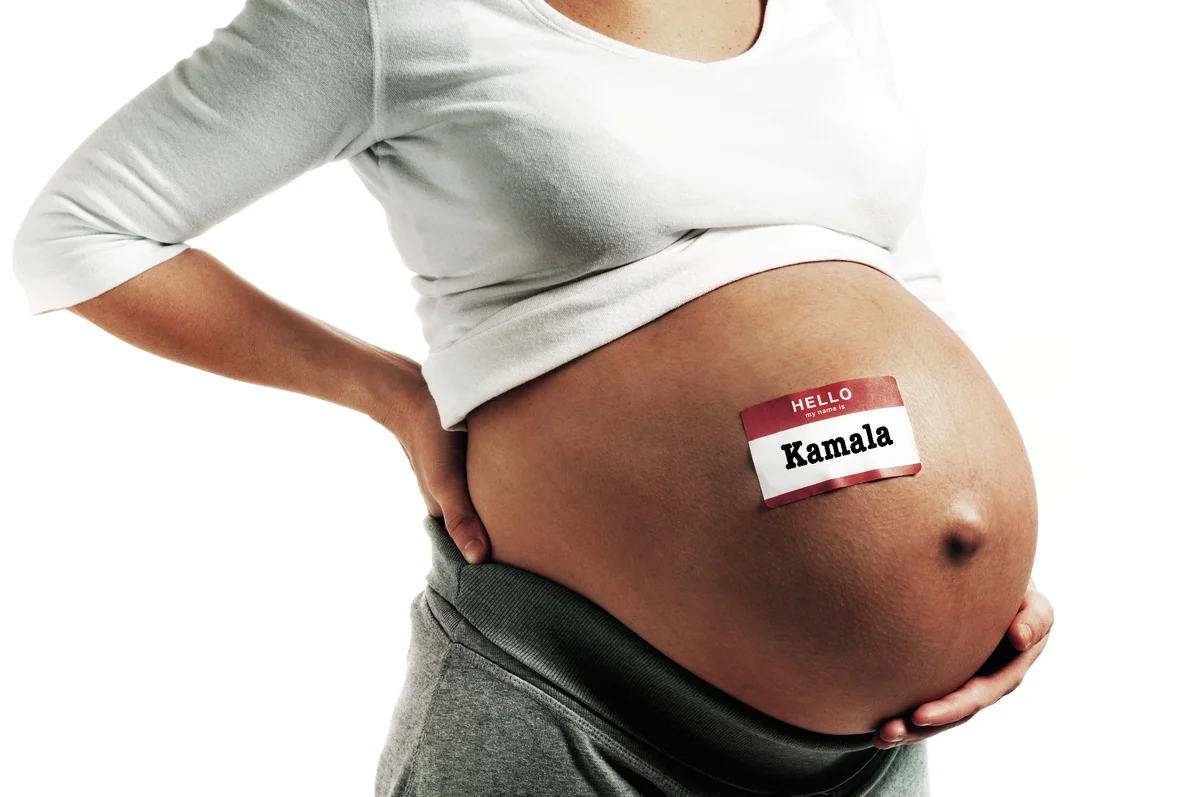Pregnant Woman with Name Tag on Bare Belly