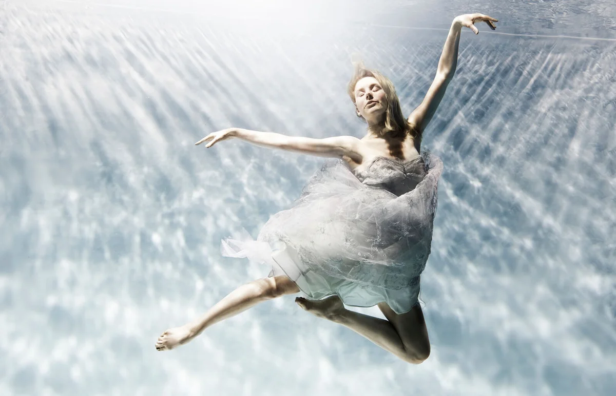 young woman floating gracefully