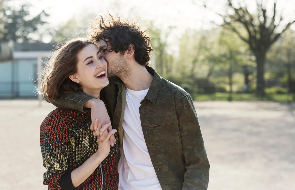 Young man kissing girlfriend