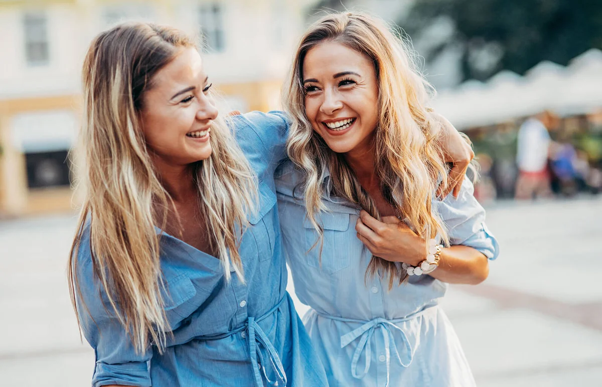 Happy twins in the city
