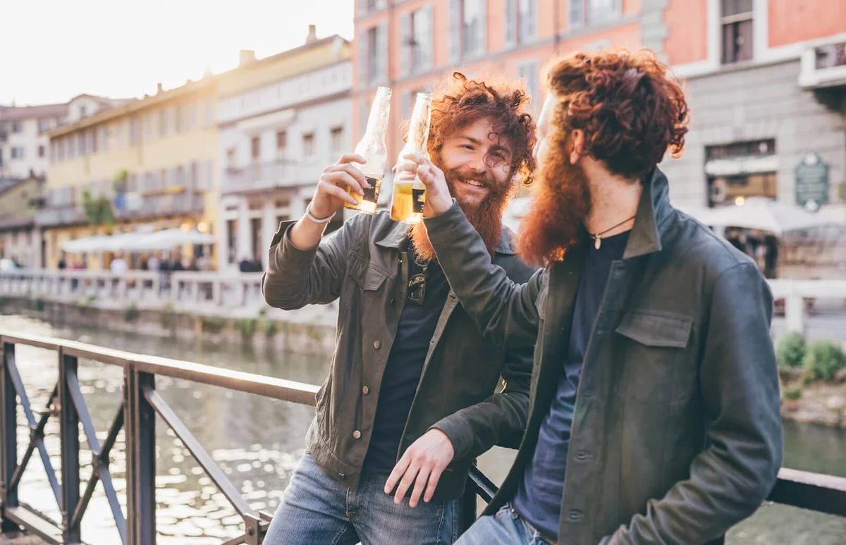 Young male hipster twins with red hair and beards