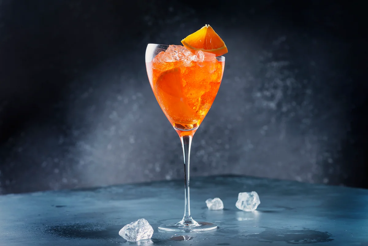 Traditional Italian aperitif Aperol Spriz with orange and ice