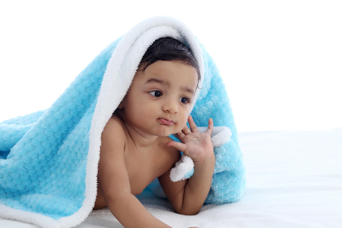 Baby boy in blue blanket