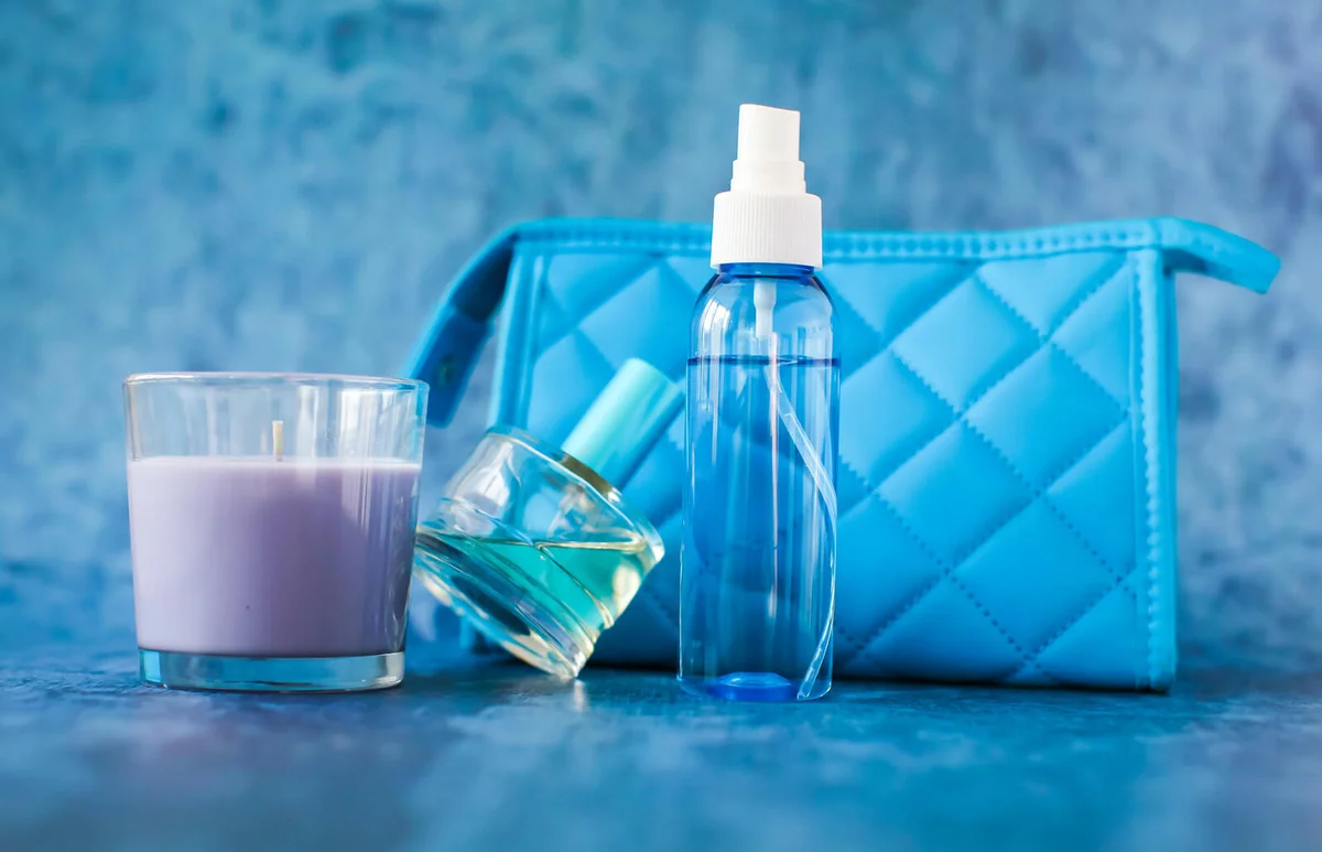 Beauty Products By Purse On Table