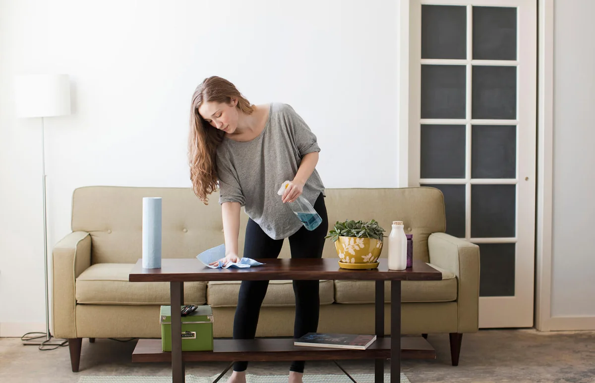 Young woman cleaning