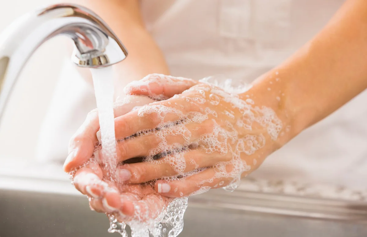 woman washing her hands