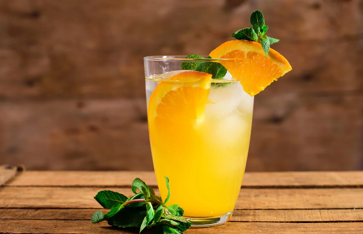 Orange juice with fresh mint leaf