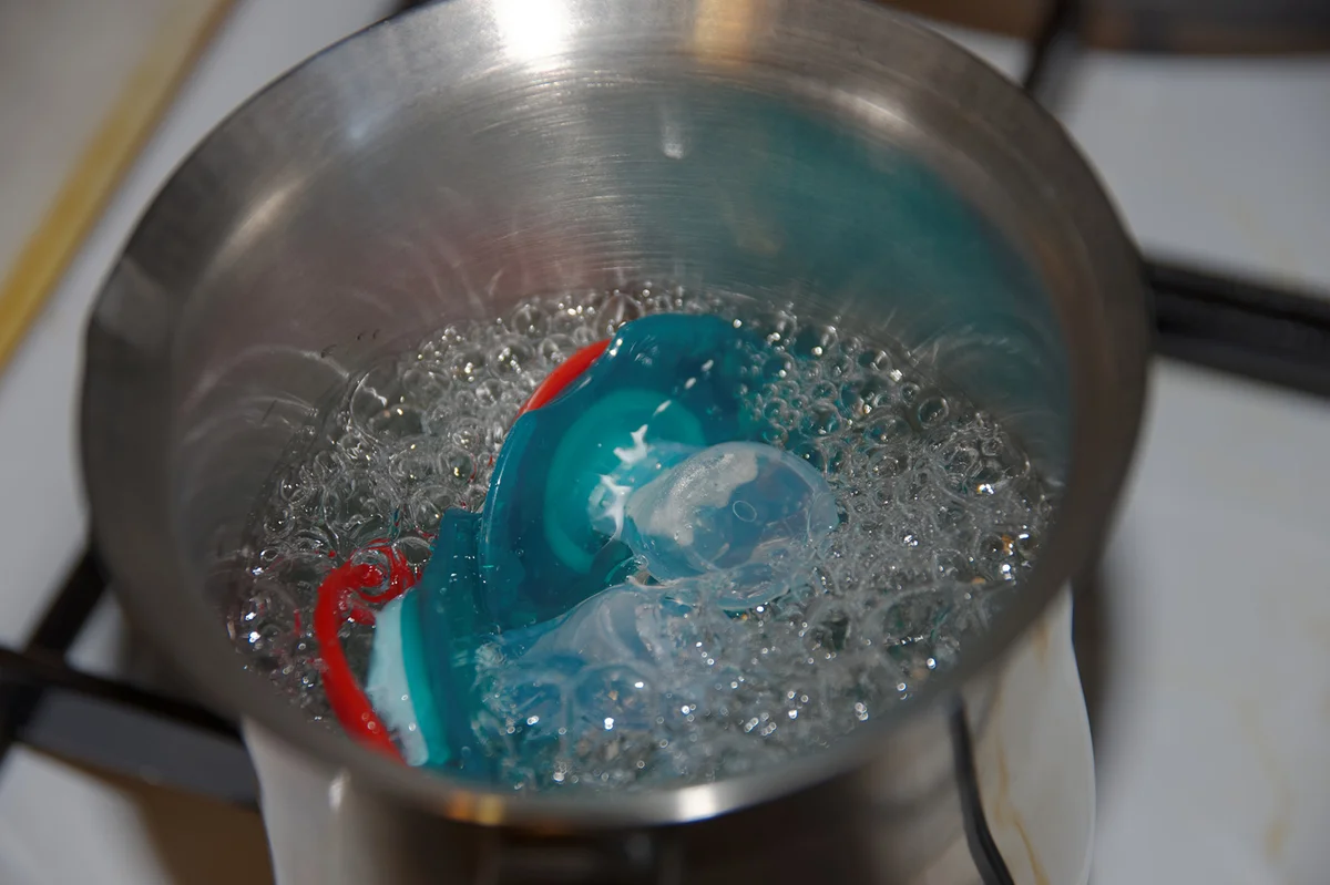 Boiling baby pacifiers on stove