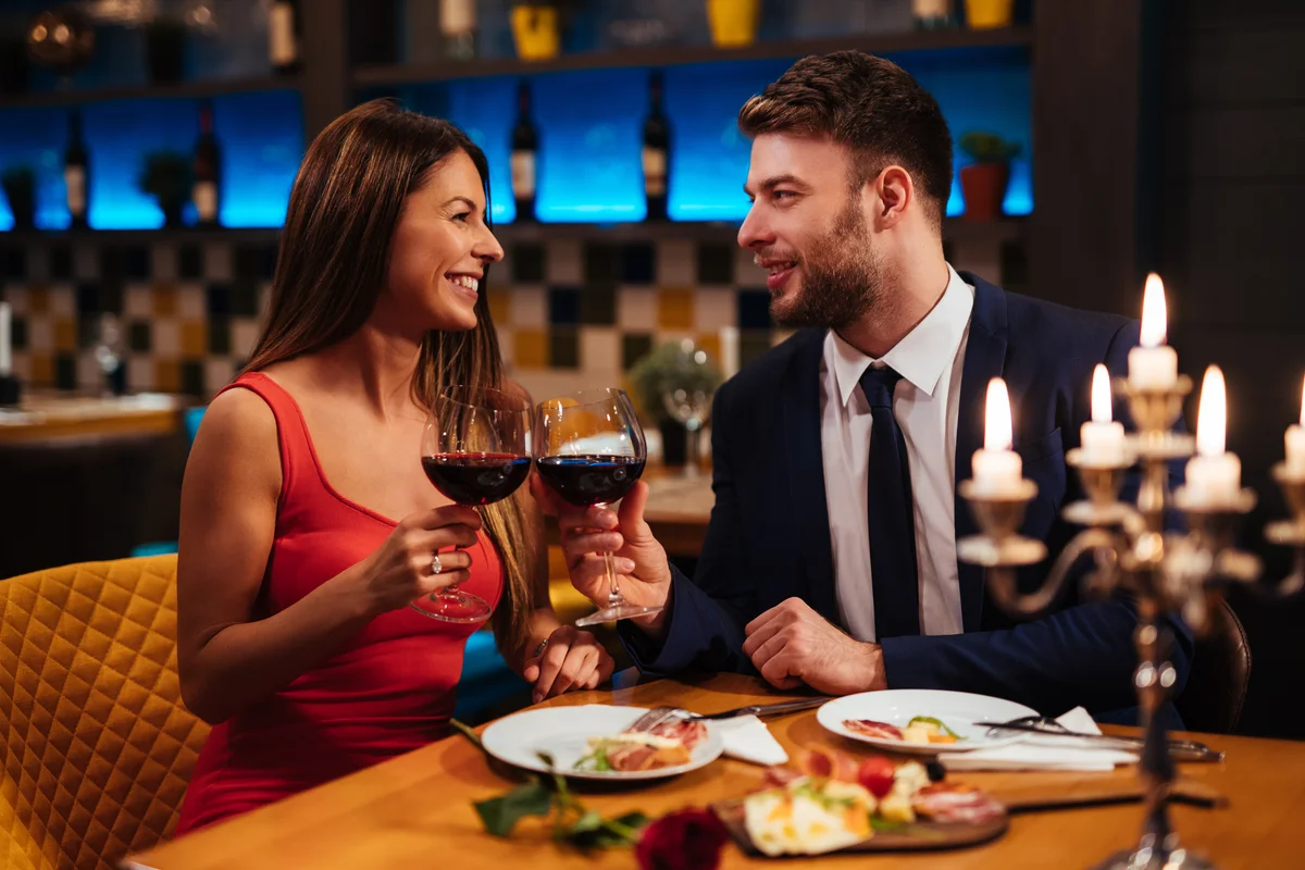 Woman and man enjoying a romantic dinner
