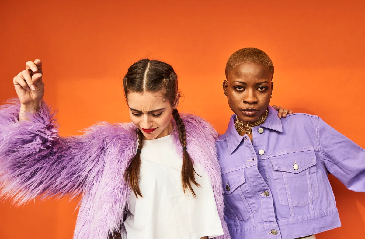 Two friends dressed in purple