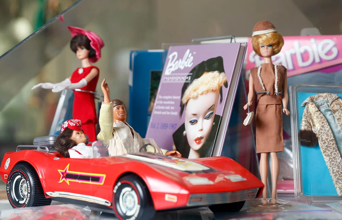 Barbie dolls are displayed during an exceptional exhibition dedicated to the Barbie doll at "La Nef des jouets" - Getty Editorial use