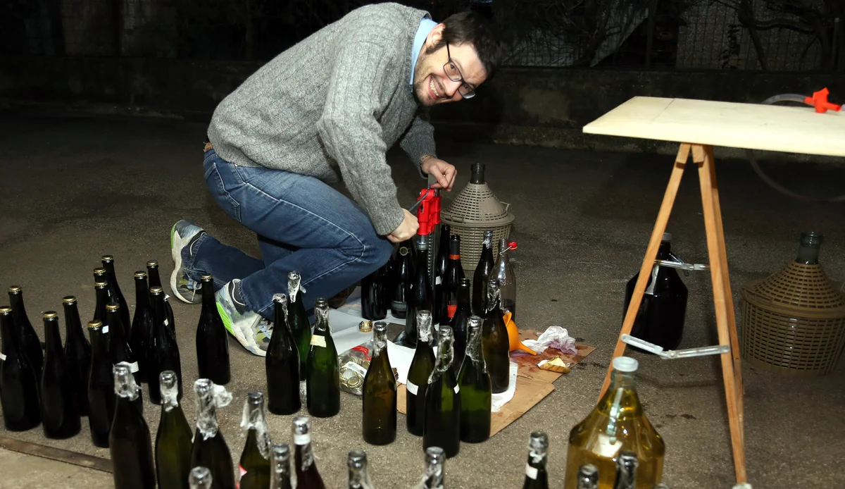 Man making wine in home