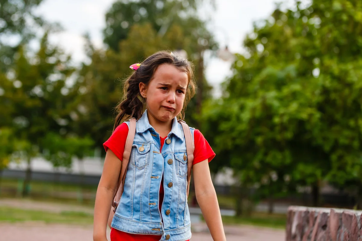 School girl crying