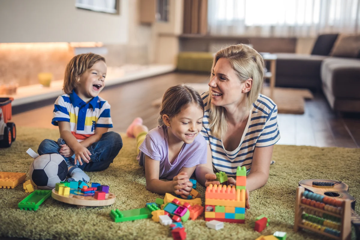 Mom playing with her two children