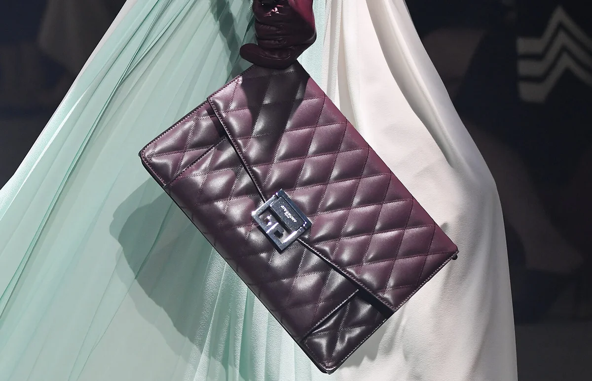 model (bag detail) walks the runway during the Givenchy - Getty Editorial Images