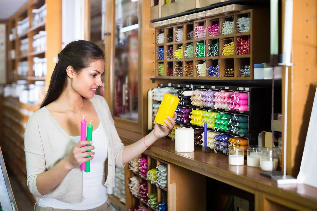 Woman buying soy candles