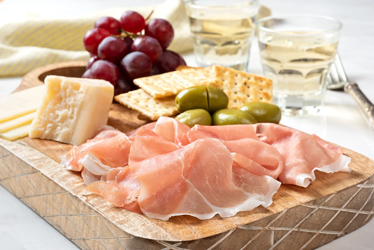 Antipasto platter and white wine