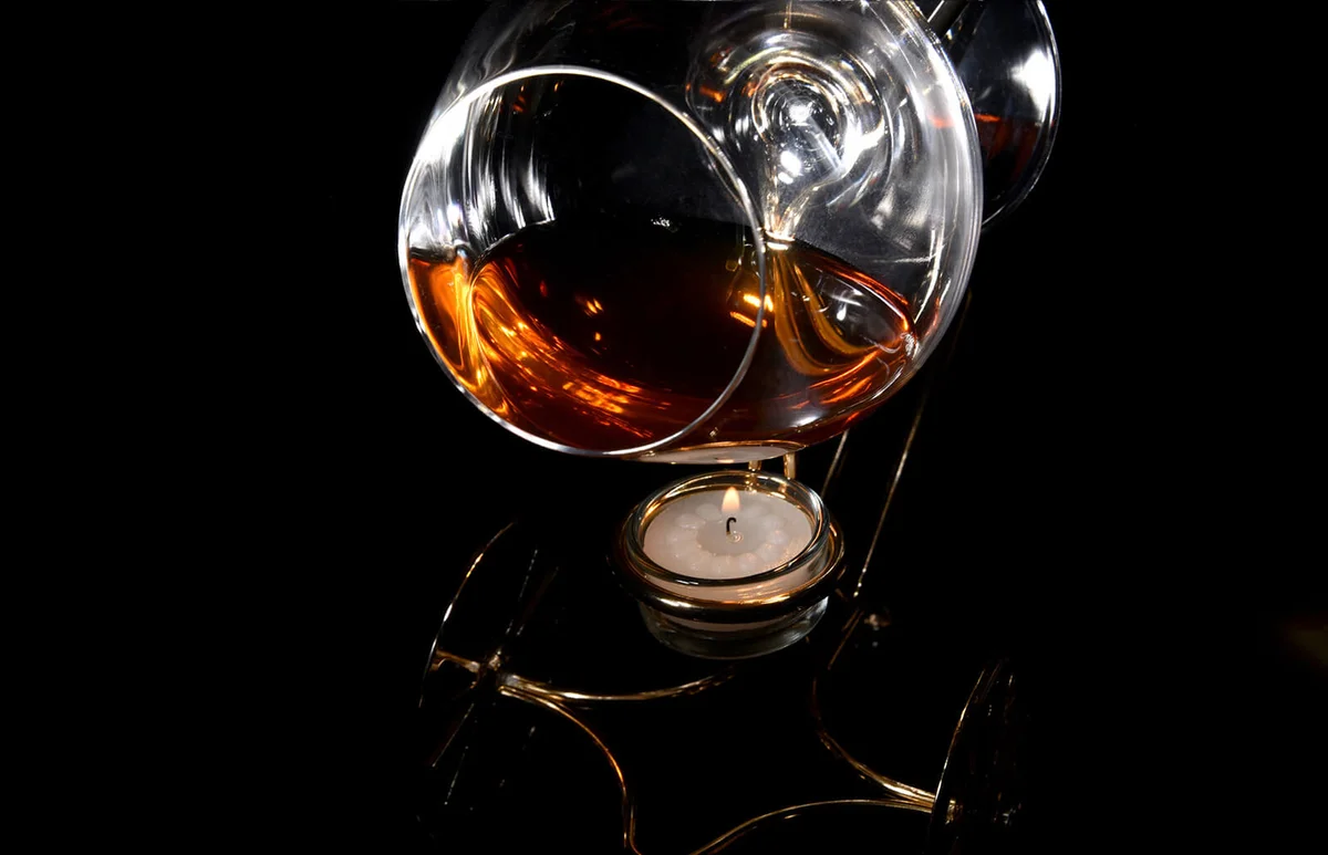 A glass of brandy on a special stand