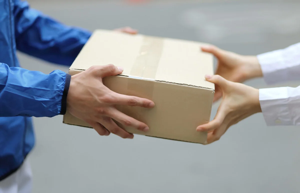 Delivery person with packages