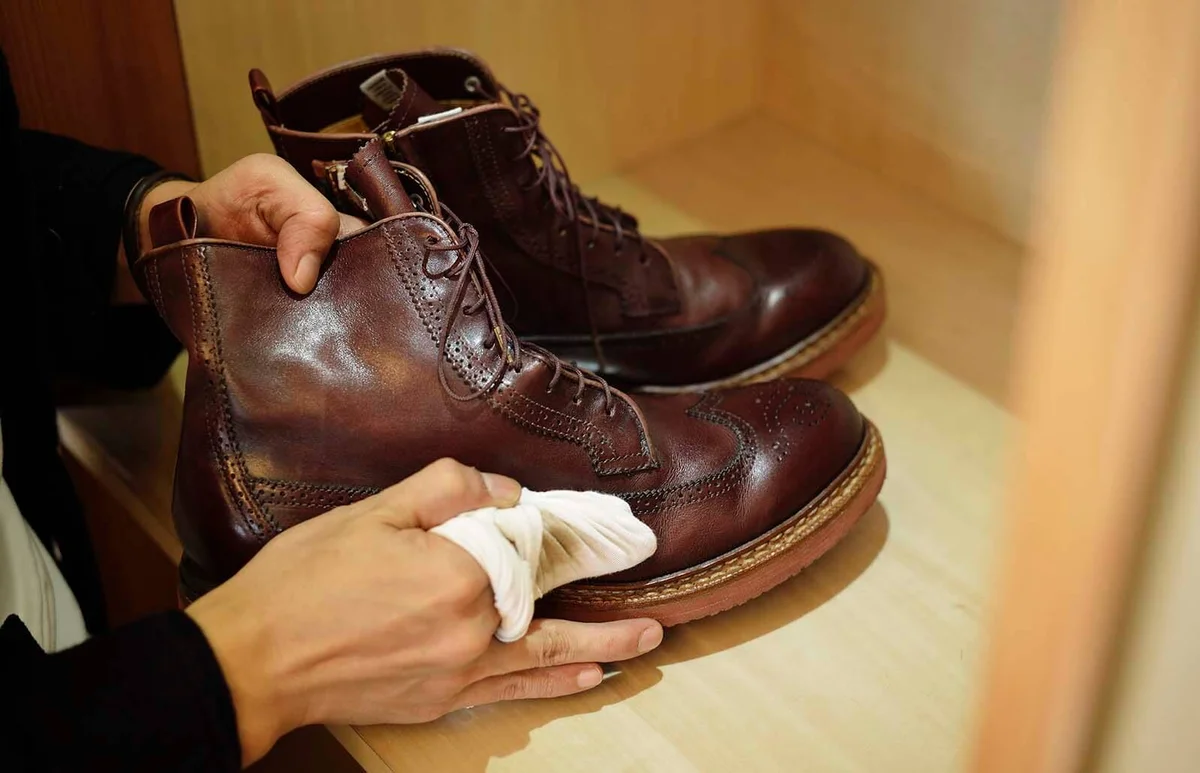 Man polishing leather shoes