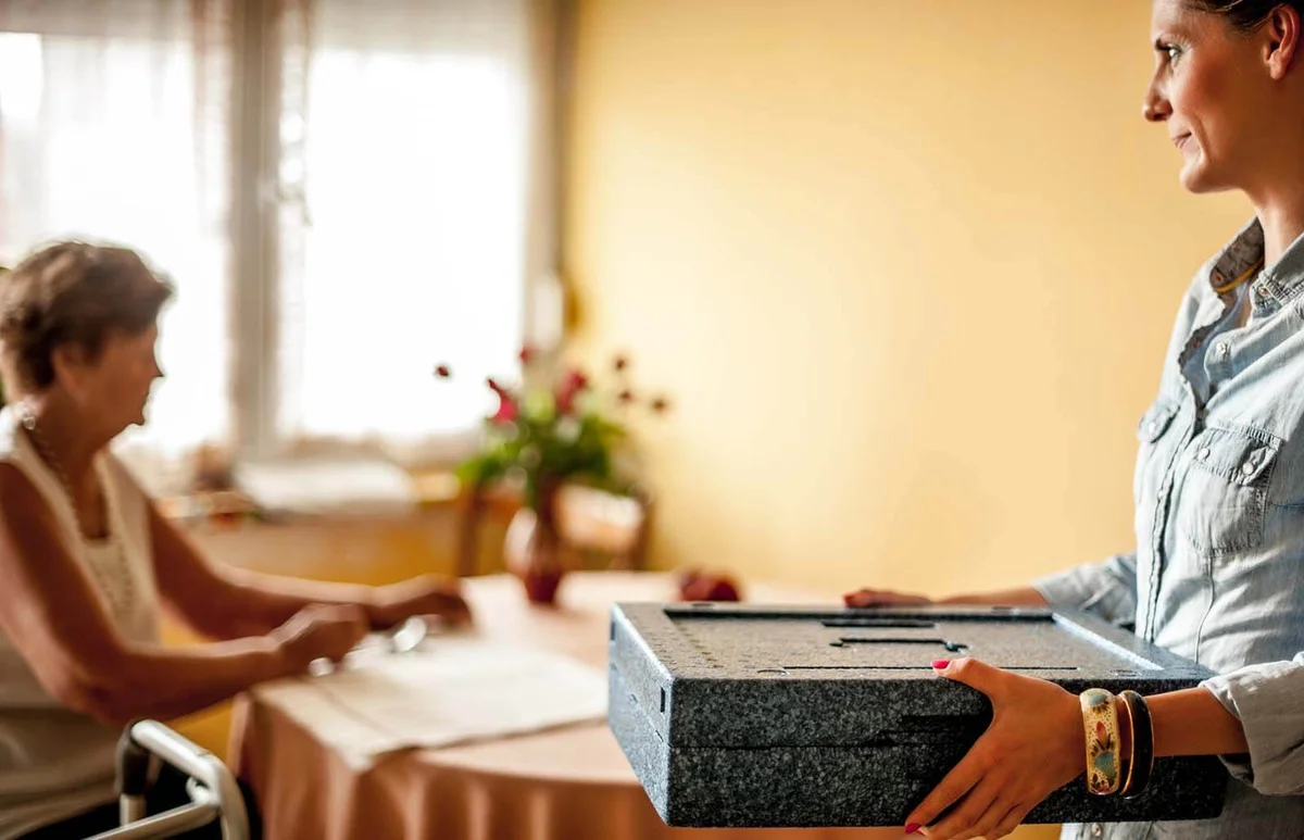 Hot Meal Delivery to an Elderly Woman at Home