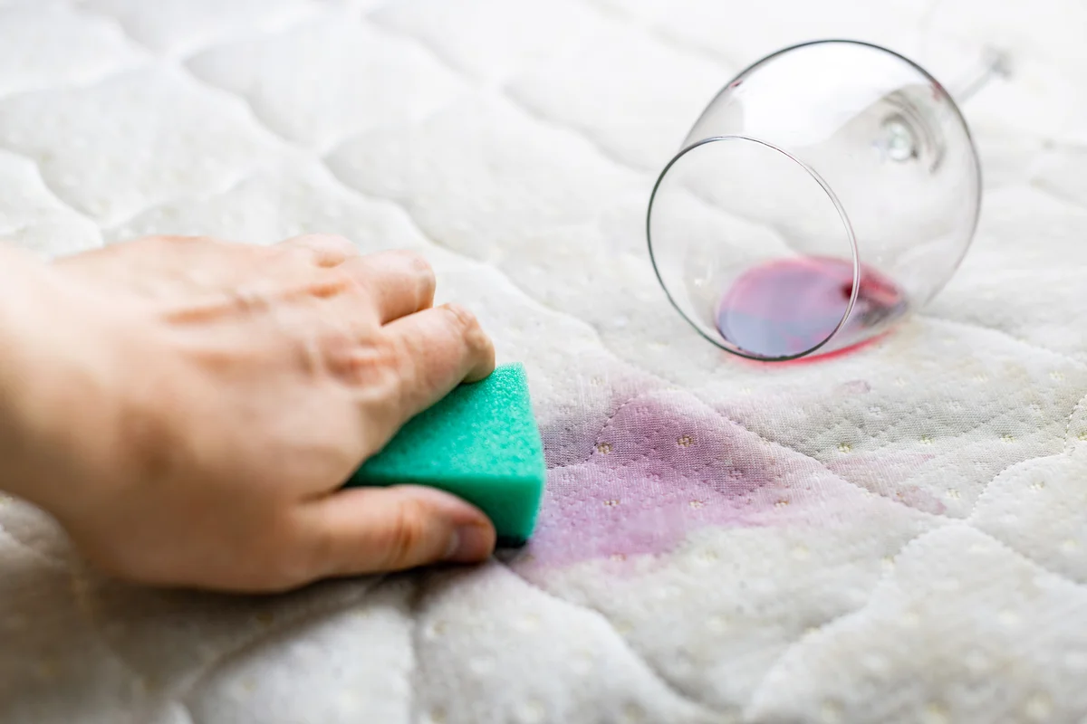 Removing wine stains from bed