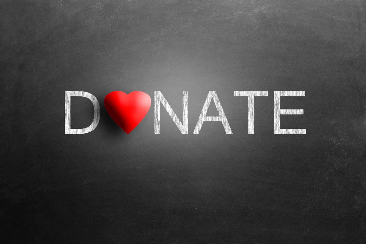 Donate word with a heart