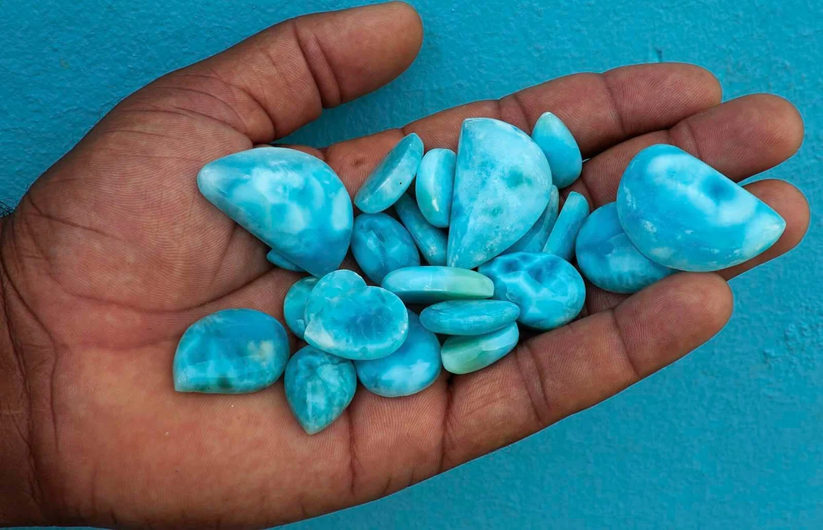 handful of beautiful polished Larimar gemstones