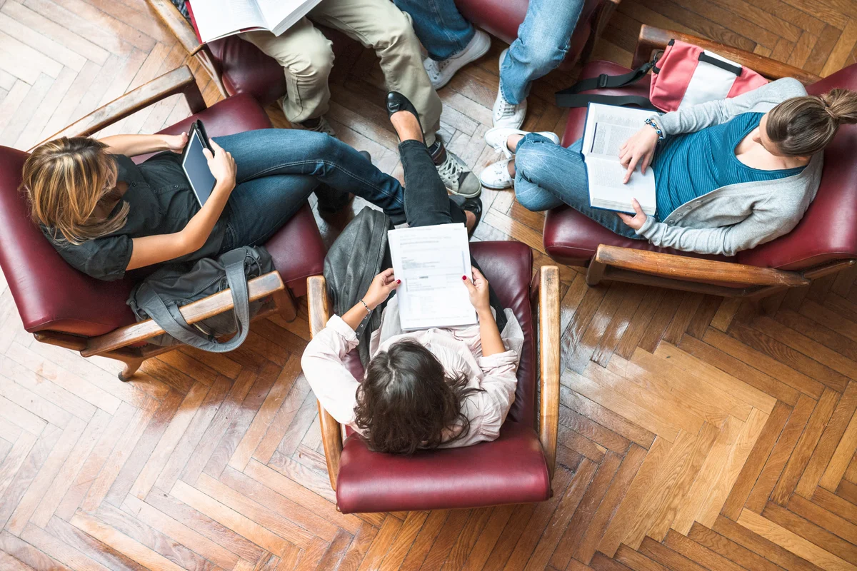 Student meeting in library