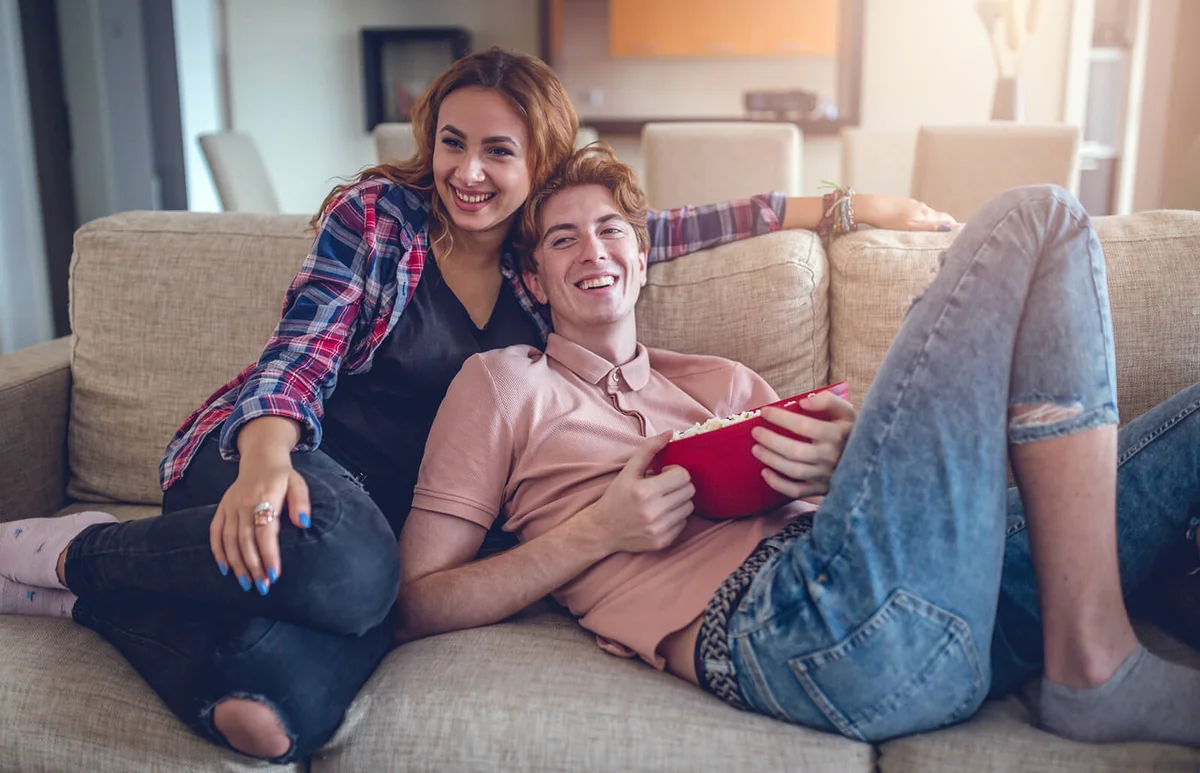 couple is watching movies at home