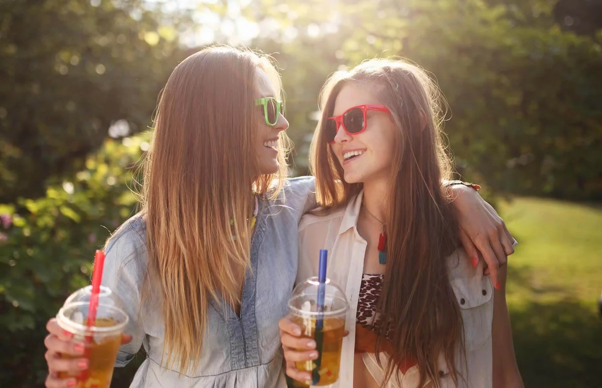 Two girls enjoying bubble tea