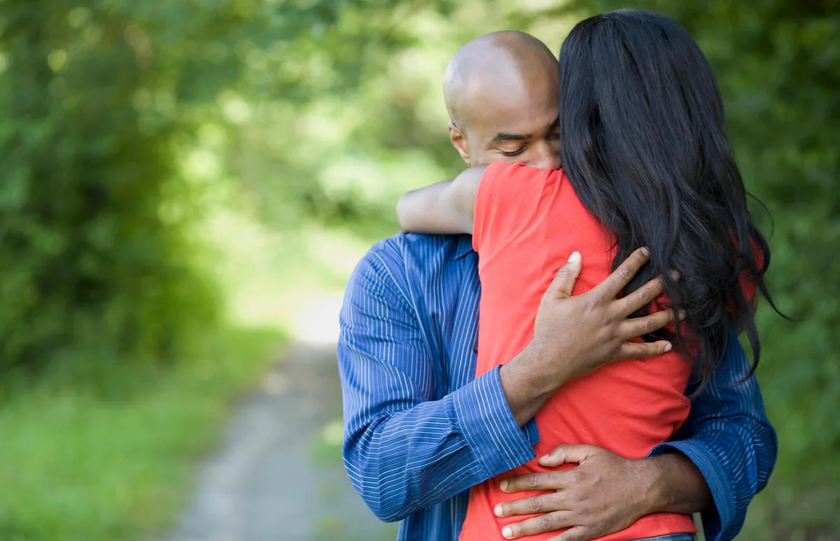couple hugging outdoors