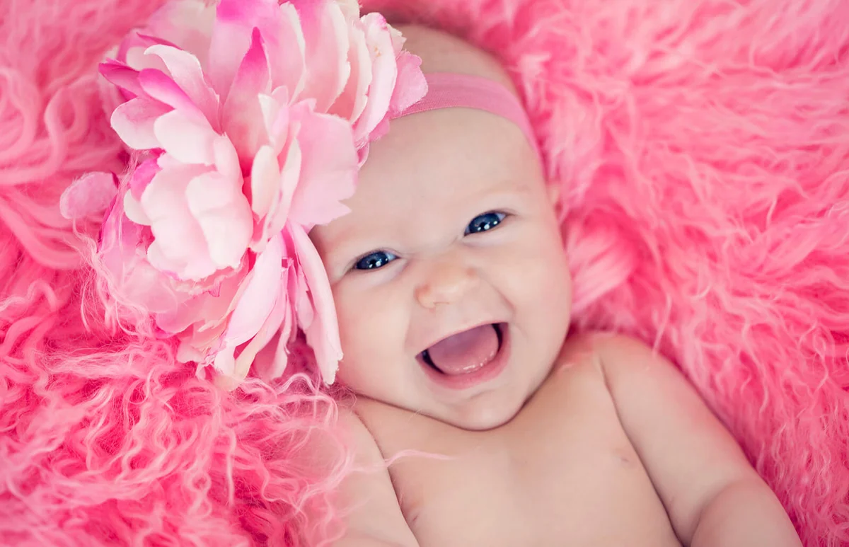 Baby girl with big flower hairband